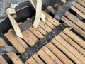 Vorrichtung zum bergen Verwundeter im Gebirge. Die Holzlattung mittig 132cm lang. Sowohl zum hinterherziehen im Schnee als auch zum Abseilen gedacht. Ungereinigtes Stück