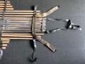 Vorrichtung zum bergen Verwundeter im Gebirge. Die Holzlattung mittig 132cm lang. Sowohl zum hinterherziehen im Schnee als auch zum Abseilen gedacht. Ungereinigtes Stück