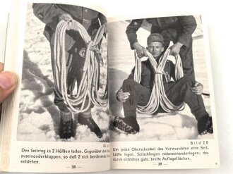 Bildheft 162 "Behelfsmäßige Verwundetenbeförderung Teil 1-4" datiert 1943, 189 Seiten, DIN A6, Umschlag defekt