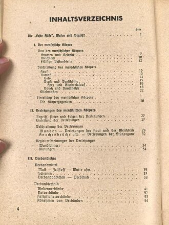 "Amtliches Unterrichtsbuch über Erste Hilfe", datiert 1943, 147 Seiten, gebraucht