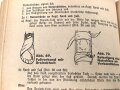 "Amtliches Unterrichtsbuch über Erste Hilfe", datiert 1943, 147 Seiten, gebraucht