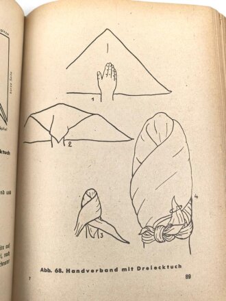 "Amtliches Unterrichtsbuch über Erste Hilfe", datiert 1941, 263 Seiten, gebraucht