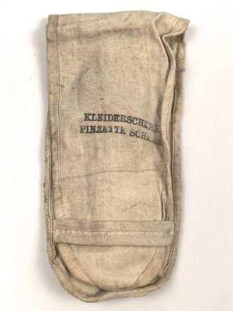 Kleiderschere, Pinzette, Schere in Tasche, gehört so...