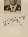Hermann Graf,  Jagdflieger mit 212 Luftsiegen im Jagdgeschwader 52 und 50, Kommodore Jagdgeschwader 11, Ritterkreuz mit Eichenlaub, Schwertern und Brillanten. Eigenhändige Unterschrift auf eingesandtem Kärtchen mit aufgeklebten Zeitungsausschnitt.