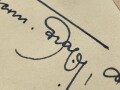 Hermann Graf,  Jagdflieger mit 212 Luftsiegen im Jagdgeschwader 52 und 50, Kommodore Jagdgeschwader 11, Ritterkreuz mit Eichenlaub, Schwertern und Brillanten. Eigenhändige Unterschrift auf eingesandtem Kärtchen mit aufgeklebten Zeitungsausschnitt.