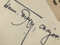 Hermann Graf,  Jagdflieger mit 212 Luftsiegen im Jagdgeschwader 52 und 50, Kommodore Jagdgeschwader 11, Ritterkreuz mit Eichenlaub, Schwertern und Brillanten. Eigenhändige Unterschrift auf eingesandtem Kärtchen mit aufgeklebten Zeitungsausschnitt.