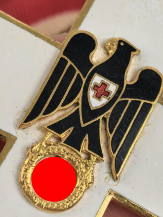Deutsches Rotes Kreuz,  Ehrenzeichen 1. Stufe (1937-1939) Halskreuz, am Band. Das Kreuz in sehr gutem Zustand, das Band mit Tragespuren