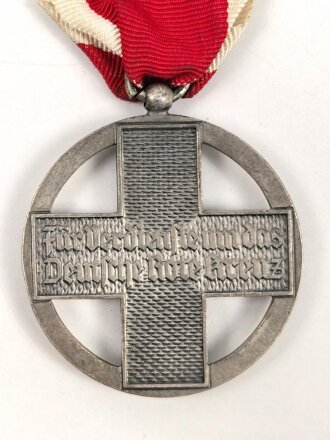 Deutsches Rotes Kreuz,  Medaille zum Ehrenzeichen  (1937-1939) am Band. Entnazifiziert, Emailleschaden