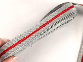Deutsches Rotes Kreuz DRK, Auszeichnungsborte Metallfaden silbern mit rotem Durchzug. Breite 15mm. Sie erhalten je 10cm von der Rolle abgeschnitten. Das letzte Foto zeigt die Kombinationen für die Dienstjahre. Siehe auch Artikelnummer 56893, 56892, 84516,