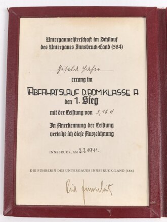 BDM Siegerurkunde in dekorativer DIN A5 Mappe " 1.Sieg bei der Untergaumeisterschaft im Skilauf des Untergaues Innsbruck Land 8 584) , datiert 1941