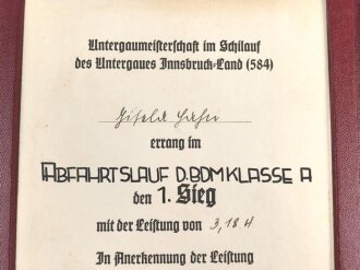 BDM Siegerurkunde in dekorativer DIN A5 Mappe " 1.Sieg bei der Untergaumeisterschaft im Skilauf des Untergaues Innsbruck Land 8 584) , datiert 1941