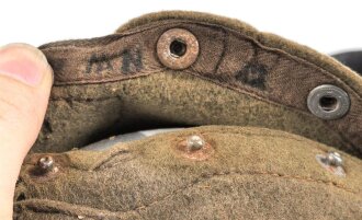 Feldflasche Wehrmacht, die Belederung unten an der Niete geklebt