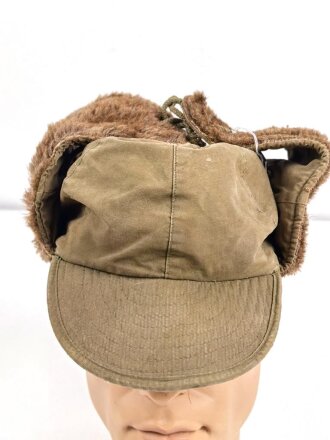 U.S. Army , M51 pile cap, well used, size 56. Uncleaned