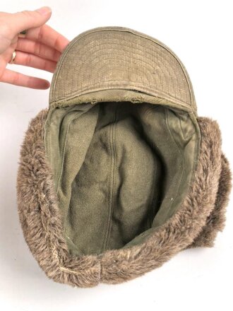 U.S. Army , M51 pile cap, well used, size 56. Uncleaned