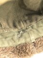 U.S. Army , M51 pile cap, well used, size 56. Uncleaned
