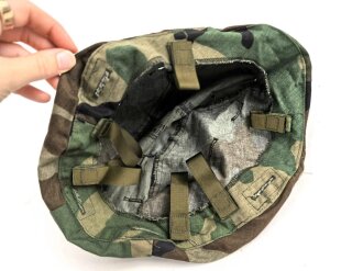 U.S. Army , 1988 ? dated U.S. Army, "Woodland" helmet cover, size medium / large