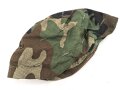 U.S. Army , 1988 ? dated U.S. Army, "Woodland" helmet cover, size medium / large