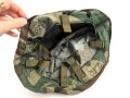 U.S. Army , 1988 ? dated U.S. Army, "Woodland" helmet cover, size medium / large