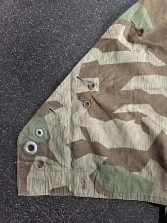 Zeltbahn 31 Wehrmacht. Farbfrisches Stück mit diversen Reparaturstellen