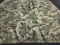 Zeltbahn 31 Wehrmacht, Getragenes Stück mit Reichsbetriebsnummer. Ungewöhnliche Ausführung, statt den üblichen Metallösen wurde Leder verwendet.