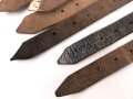 Sieben Stück Tornister / Mantelriemen, meiner Meinung nach Deutschland nach 1945, teilweise nachgestempelt
