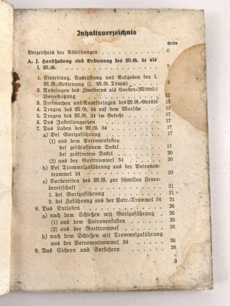 "Beschreibung, Handhabung und Bedienung des M.G. 34 als leichtes M.G., schweres M.G. und in der Fliegerabwehr Teil 1 und 2" datiert 1939, 96 Seiten, DIN A6, Wasserschaden