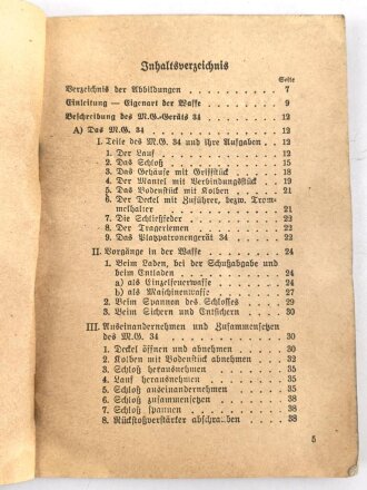 "Beschreibung, Handhabung und Bedienung des M.G. 34 als leichtes M.G., schweres M.G. und in der Fliegerabwehr Teil 1 und 2" datiert 1939, 96 Seiten, DIN A6, Wasserschaden