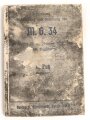 "Beschreibung, Handhabung und Bedienung des M.G. 34 als leichtes M.G., schweres M.G. und in der Fliegerabwehr Teil 1 und 2" datiert 1939, 96 Seiten, DIN A6, Wasserschaden