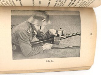 D. 127/1 "Anleitung für die Bedienung und Verwendung des M.G. 3,4 Teil 1" datiert 1936, 102 Seiten, DIN A6, gebraucht