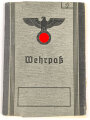 Wehrpaß ausgestellt 29.11.1939 in Hildesheim. Ohne weitere Einträge, dazu ein Schreiben " Nachlaßgut Ihres im Kampf gefallenen Ehemannes" von 1943