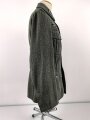 Heer, Feldbluse Modell 1940 für einen Obergefreiten der Kraftfahrtruppe. Leicht getragenes Kammerstück von 1941 . Die Kragenspiegel maschinenvernäht, der Brustadler von Hand. Im Rückenbereich diverse kleinere Schäden, sonst gut