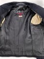 Kriegsmarine, dunkelblaue Paradejacke für einen Maschinenobergefreiten. Kammerstück von 1936, die Effekten original vernäht. Guter Zustand