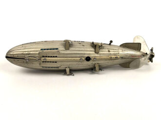 Luftschiff / Zeppelin " LZ 129 Hindenburg" als Kinderspielzeug aus Blech der Firma " Tippco"  Länge 29cm, Original Bemalt, die Luftschraube aus Zelluloid, Funktioniert einwandfrei. Ungereinigtes Stück