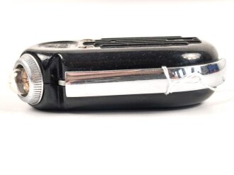Dynamo Taschenlampe aus brauner Preßmasse....