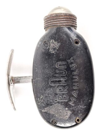 Dynamo Taschenlampe aus brauner Preßmasse....