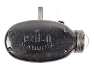 Dynamo Taschenlampe aus brauner Preßmasse. Hersteller "MANULUX" Defekt, WaA