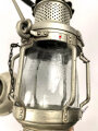 Kriegsmarine, Laterne aus Leichtmetall. Gesamthöhe etwa 38cm, aufwendige Konstruktion mit Nachschiebevorrichtung für eine Kerze. Guter Gesamtzustand
