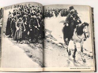 "Eine ganze Welt gegen uns"  Eine geschichte des  Weltkriegs in Bildern, datiert 1934, über DIN A4, gebraucht