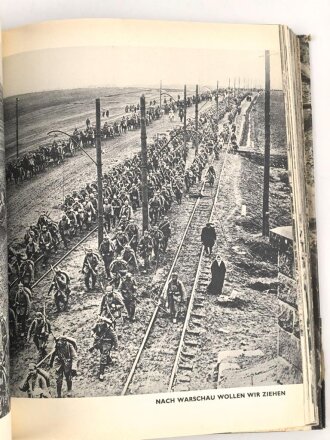 "Eine ganze Welt gegen uns"  Eine geschichte des  Weltkriegs in Bildern, datiert 1934, über DIN A4, gebraucht