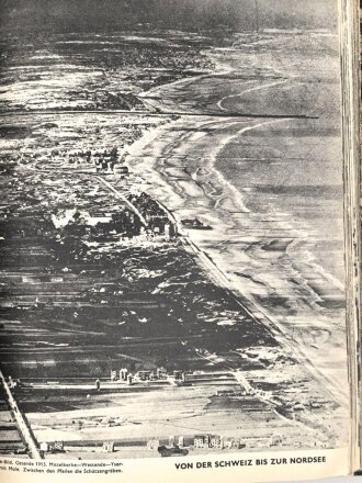 "Eine ganze Welt gegen uns"  Eine geschichte des  Weltkriegs in Bildern, datiert 1934, über DIN A4, gebraucht