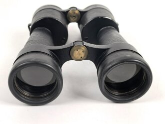 Dienstglas 10 x 50 der Wehrmacht. Unter deutscher Besatzung gefertigt von Huet Paris. Klare Durchsicht, Strichplatte rechts deutlich. Selten