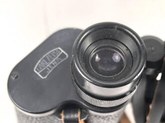 Ziviles Doppelfernrohr 7 x 50 " Binoctar", Hersteller "Carl Zeiss Jena" . Nahezu identisch mit der Ausführung für die Wehrmacht, selbst die Strichplatte ist vorhanden. Vermutlich direkt nach dem Krieg aus vorhandenen Teilen gefertigt. Sehr gute Durchsicht