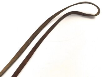 Trageriemen für ein Fernglas. Dunkelbraunes Leder,...