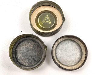 Drei Schraubkappen für Gasmaskenfilter