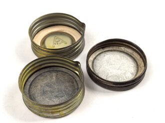Drei Schraubkappen für Gasmaskenfilter
