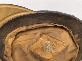 Heer, Schirmmütze für Mannschaften der Kavallerie. Kopfgrösse 57. Getragenes Stück, etliche Mottenaufrauhungen, sonst in gutem Gesamtzustand