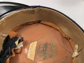 Feuerwehr III.Reich, Schirmmütze für Mannschaften. Die Biese leicht mottig, Schirm seitlich lose, Mützenkörper vorne defekt. Kopfgrösse 57