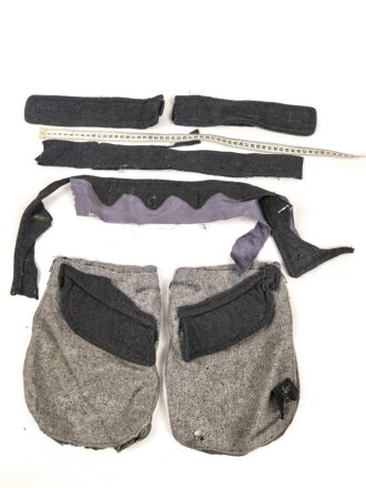 Konvolut Reste von einem Mantel der Luftwaffe.