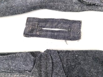 Konvolut Reste von einem Mantel der Luftwaffe.