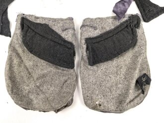 Konvolut Reste von einem Mantel der Luftwaffe.